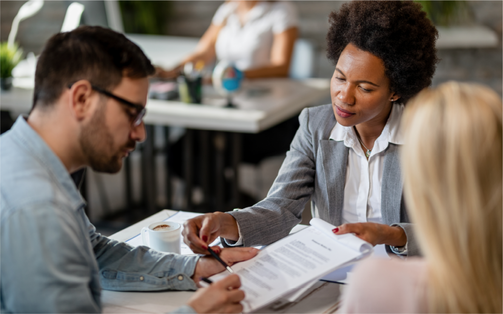 insurance agent helping clients